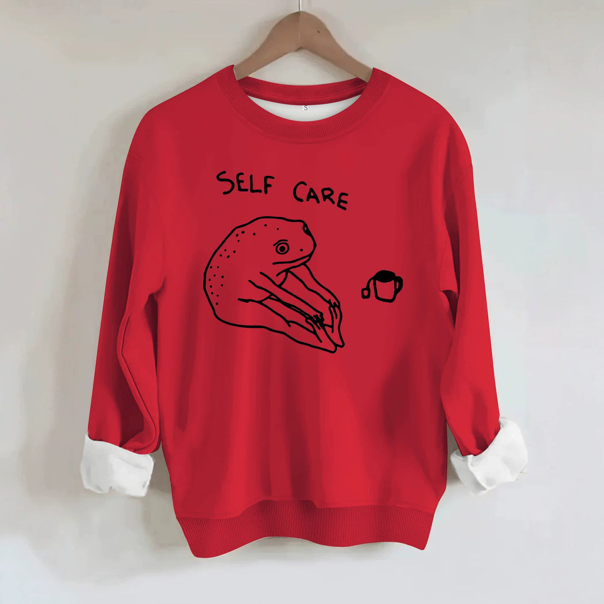 Békamintás női pulóver „Self Care” felirattal