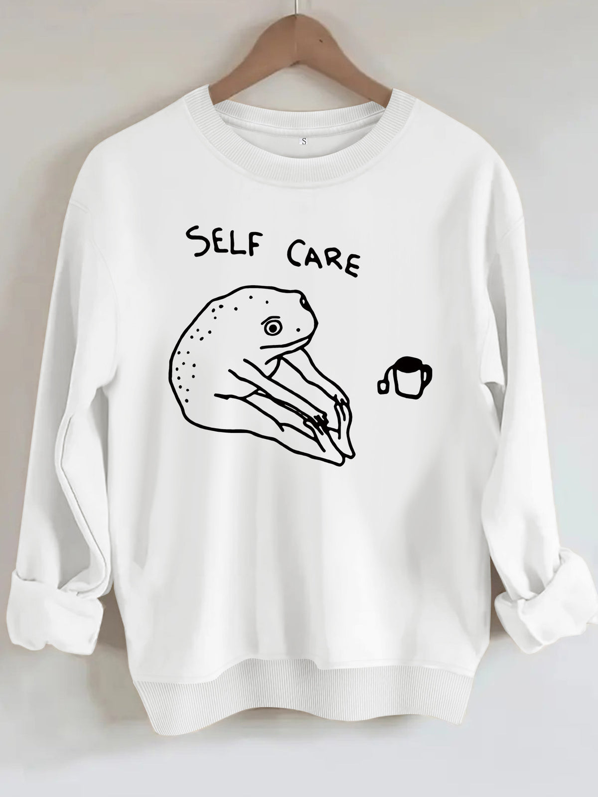 Békamintás női pulóver „Self Care” felirattal