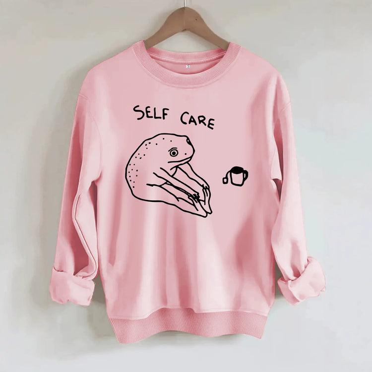 Békamintás női pulóver „Self Care” felirattal