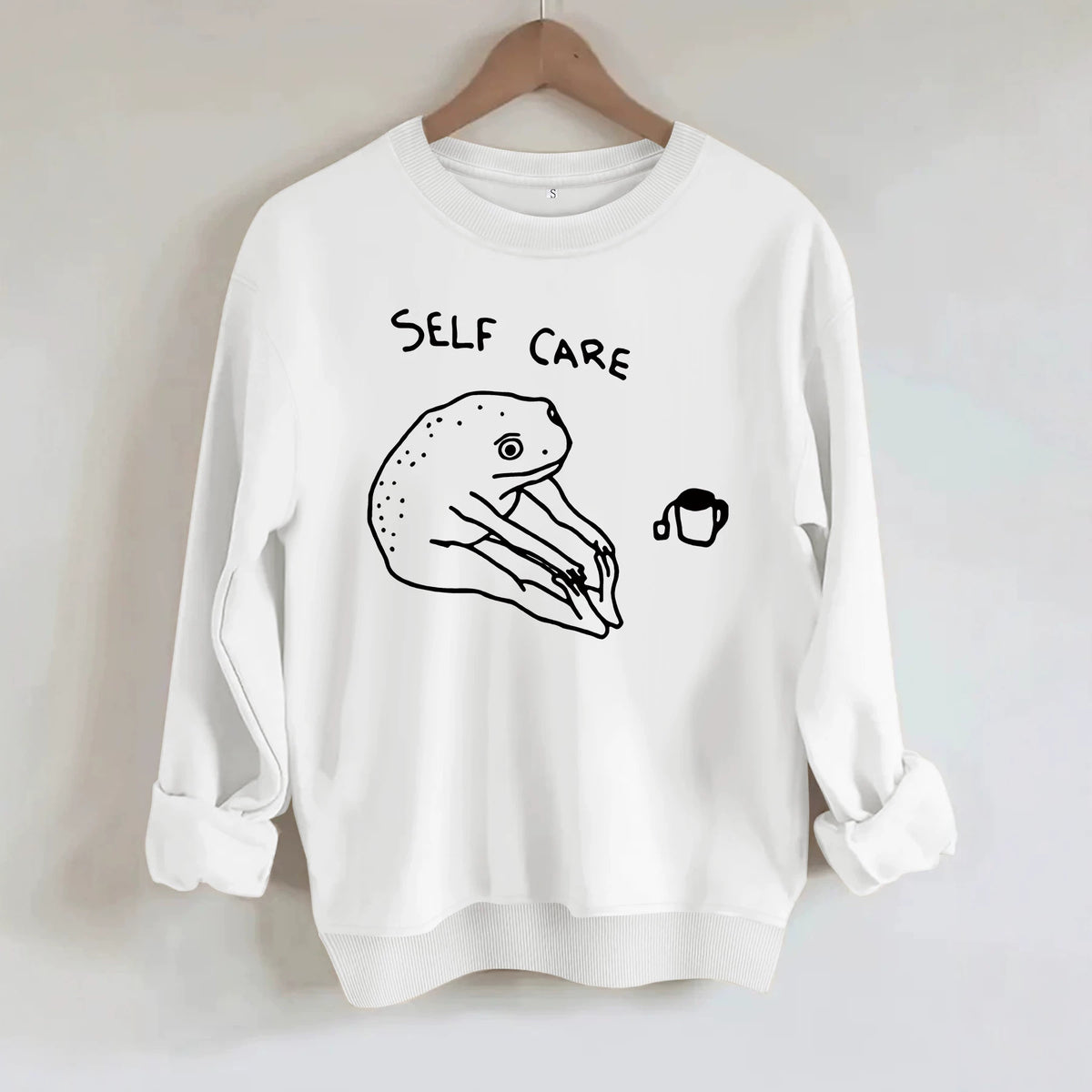 Békamintás női pulóver „Self Care” felirattal