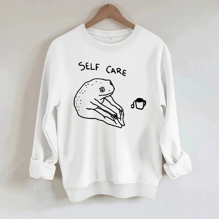 Békamintás női pulóver „Self Care” felirattal