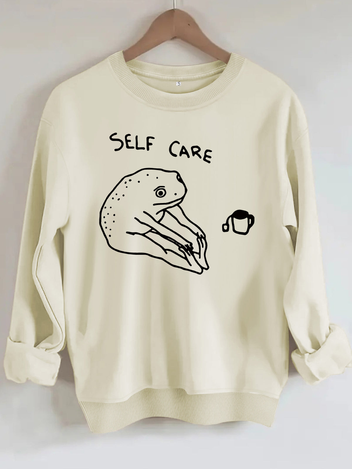 Békamintás női pulóver „Self Care” felirattal