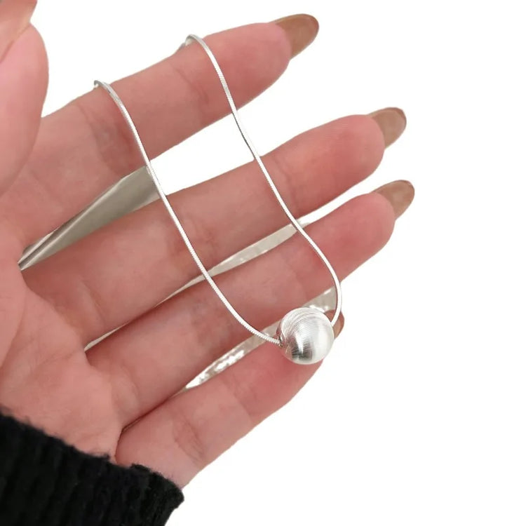 Women's silver necklace with a zirconia pendant