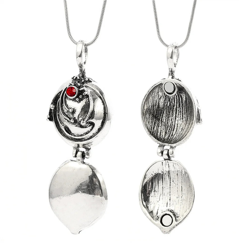 Antique silver-tone women's necklace with an ornate pendant