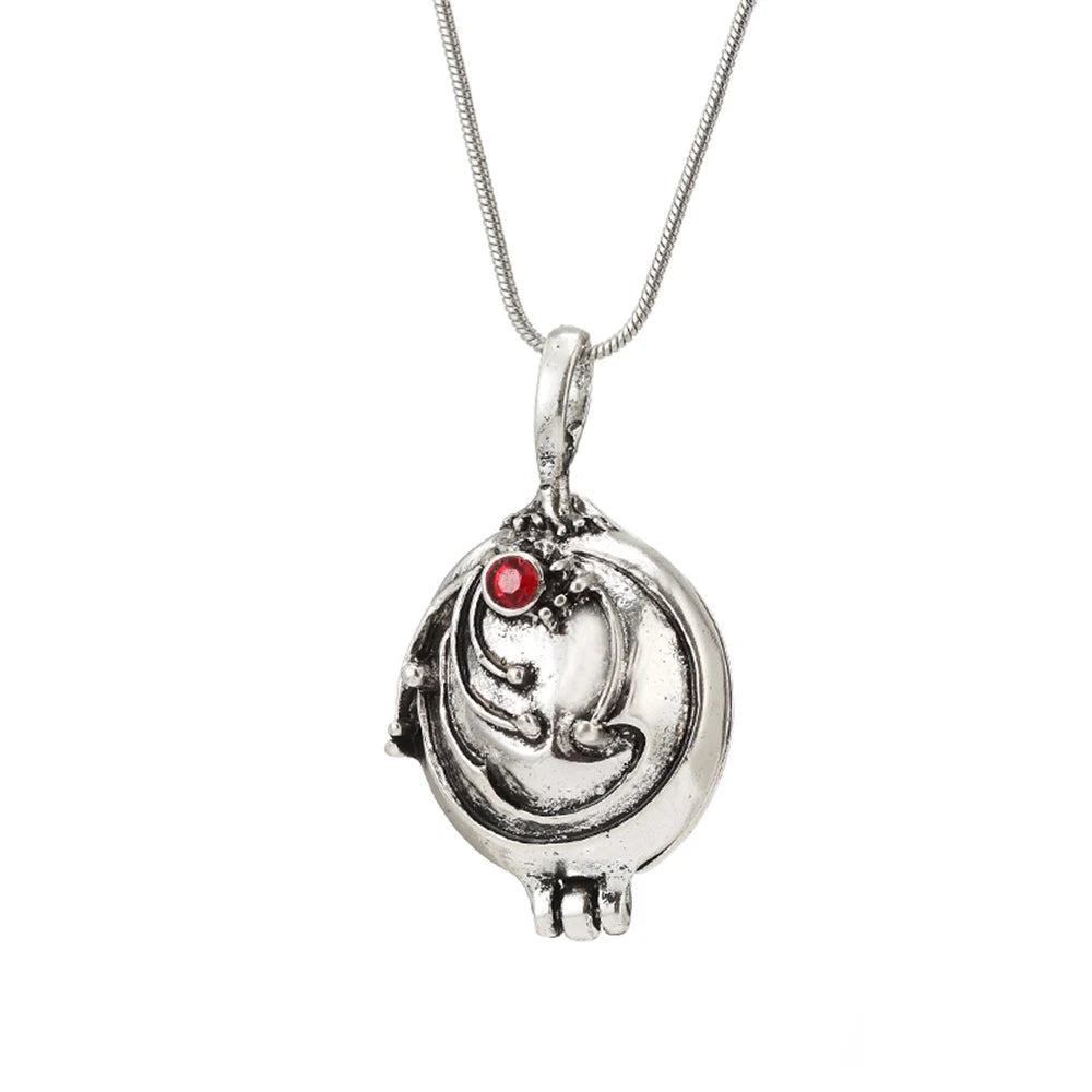 Antique silver-tone women's necklace with an ornate pendant